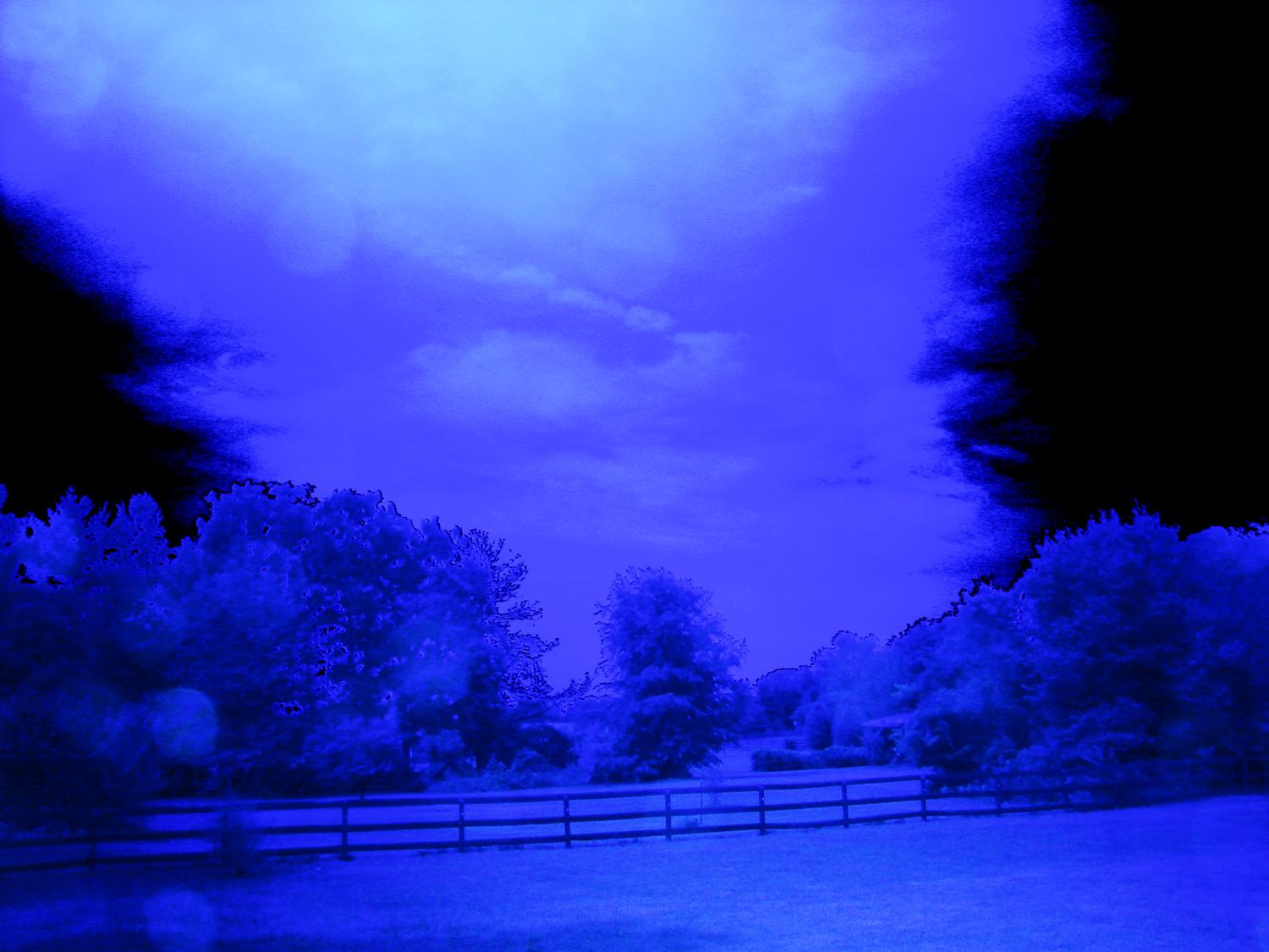 view of the sun setting behind the artist's studio. Color are shades of blue - Blue Field View # 1 - Techno-Impressionist Museum - Techno-Impressionism - art - beautiful - photo photography picture - by Tony Karp