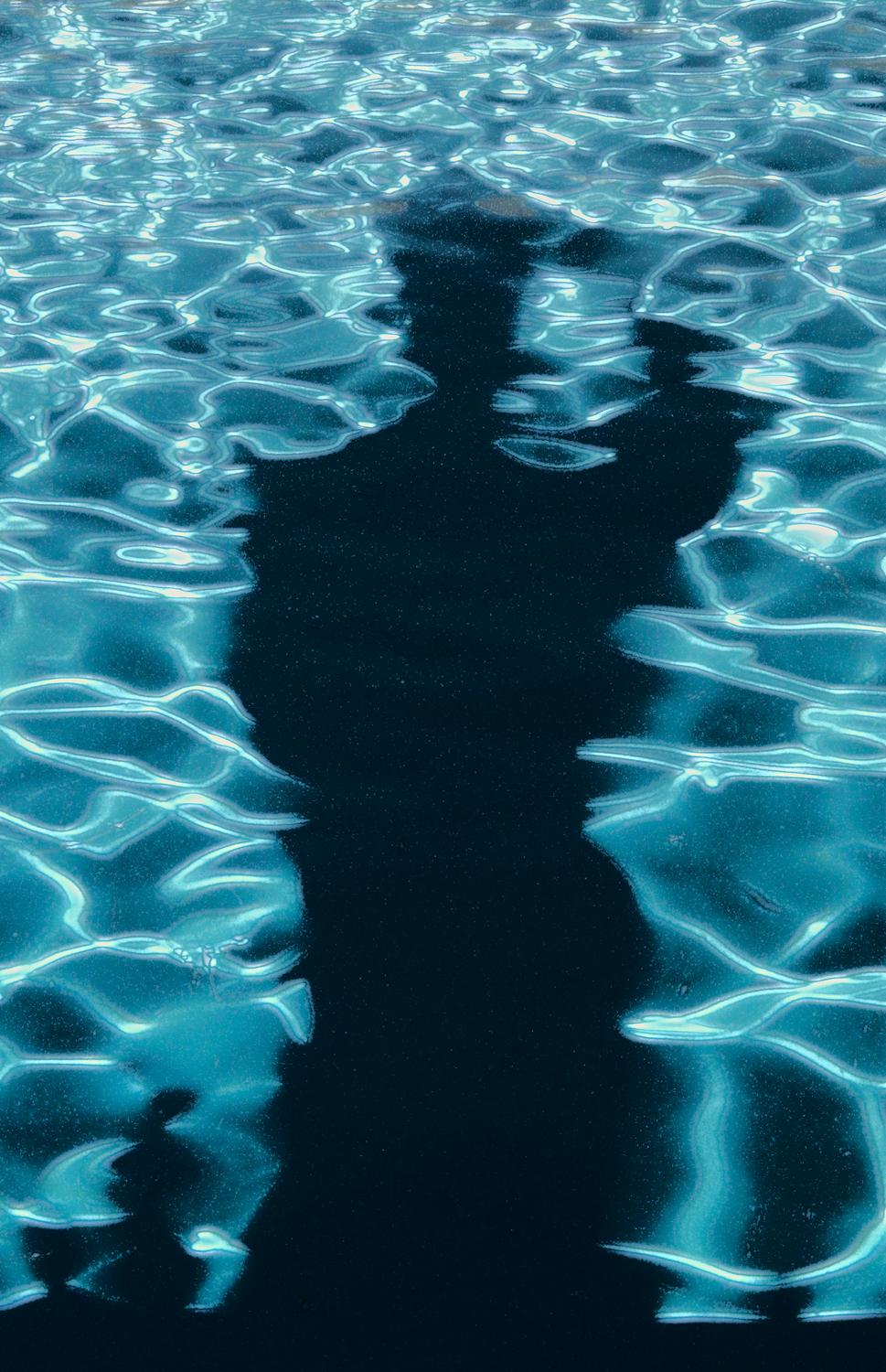 black shadow against the blue moving water in the pool - Artist's shadow in the pool - Techno-Impressionist Museum - Techno-Impressionism - art - beautiful - photo photography picture - by Tony Karp